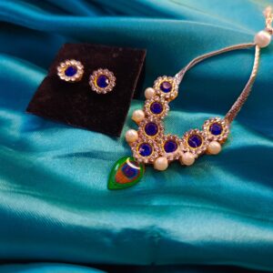 Peacock-Inspired Pendant with Blue Gem